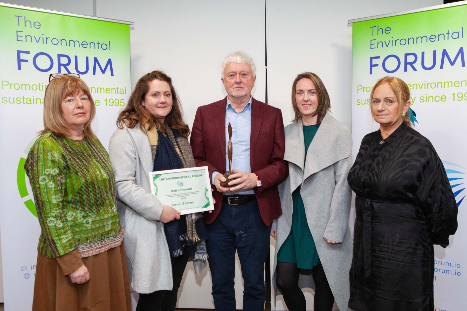 Joe Aherne and family accepting the Lifetime Achievement Award presented posthumously to Anna Aherne