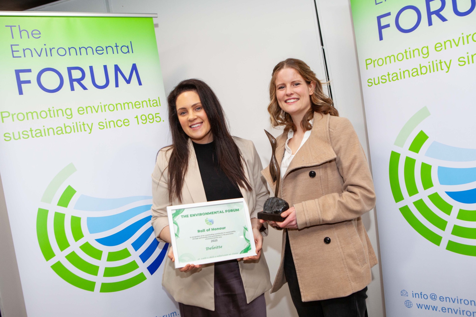 Representatives of the Deloitte Hot Spot Peatland Restoration Project receiving the Business and Commercial Sector Award