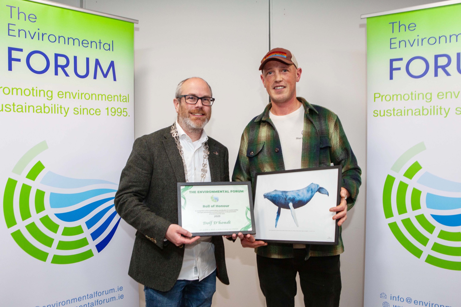 Mark McLean accepting Dolf D'hondt's environmental commendation at the 2025 Awards ceremony